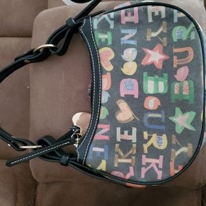 Dooney and bourke egg pouchette